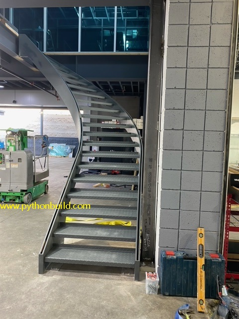 Steel beam curved stairs