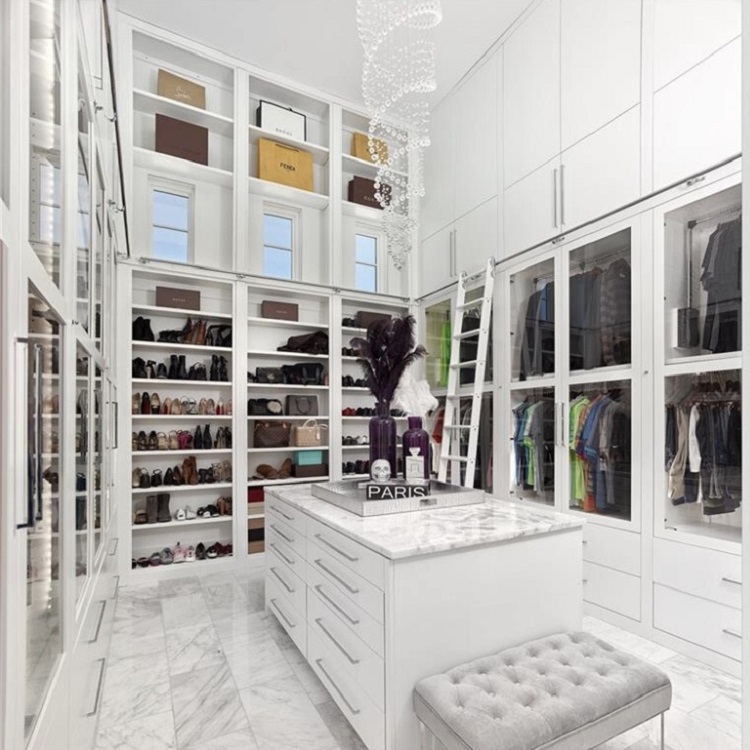 Luxury U shape walk-in closet with dressing table and island