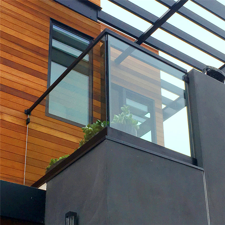 Balcony black u channel glass railing with square handrail 