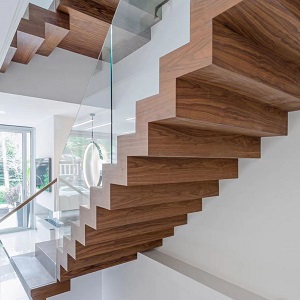 Zig-zag steel wood stairs with glass railing 